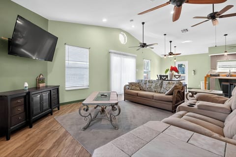 Relax in the spacious living room to unwind after a long day exploring the area.