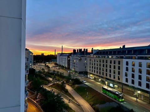 Watch the neighborhood wake up or wind down from the cozy balcony.