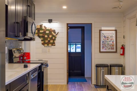 Kitchen view leading to the back door — thoughtfully designed for comfort and convenience during your stay.