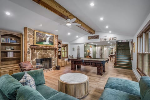 Sink into comfort by the fire, challenge your friends to pool, or binge your favorite shows—this space has it all.