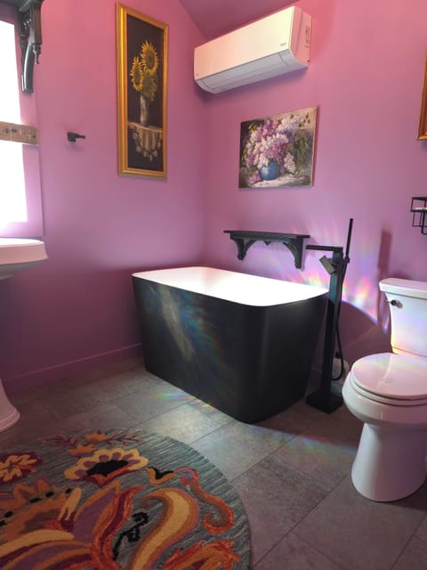 First floor luxury bathroom with large walk in shower.