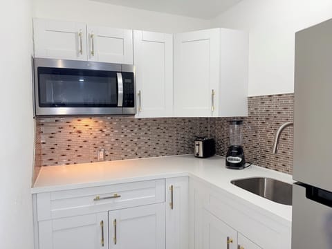 Kitchen, microwave, sink, refrigerator