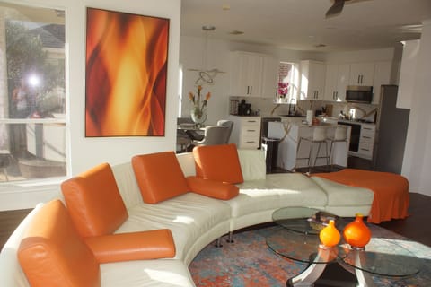 Unwind on the oversized sectional while taking in breathtaking lake views