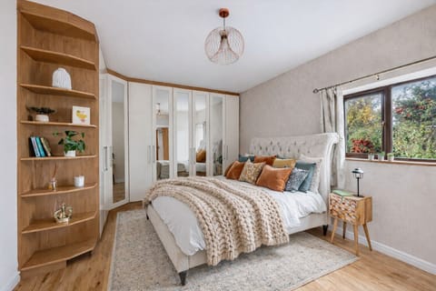 Bedroom 1 features a comfortable king sized bed with fresh linen and towels provided.