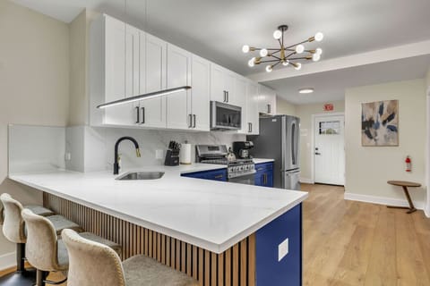 Clean and modern kitchen with an attached dining space