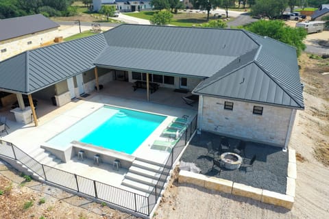 Gorgeous pool with swim up bar and large tanning shelf