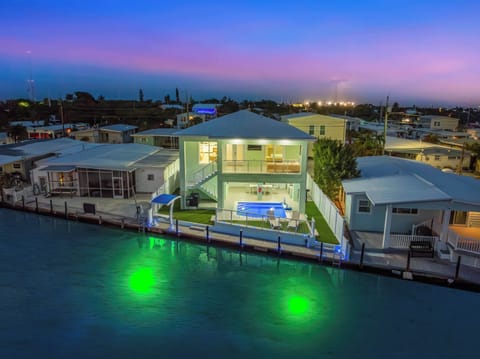 As day turns to dusk, your waterfront oasis comes alive with glowing dock lights and the promise of unforgettable Florida Keys evenings under the stars.