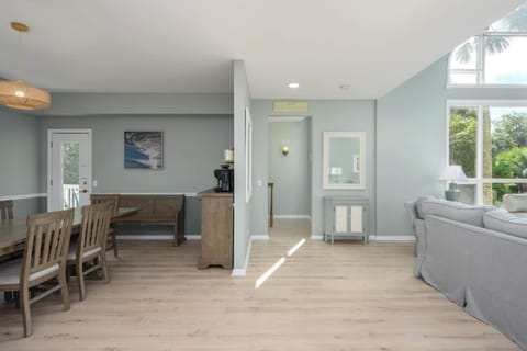 Elegant Dining for All – Gather around the large table that seats 10, perfect for family meals or entertaining friends.