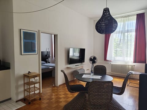 Living room with sofa and dining table
