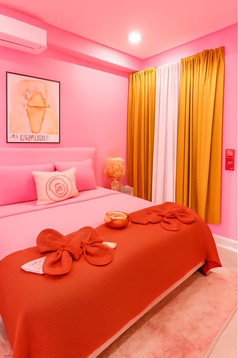 Soft pink tones and plush textures create the ultimate comfort zone.