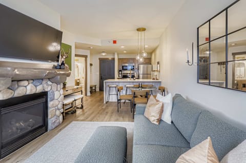 View from the window back into the condo, living room and kitchen