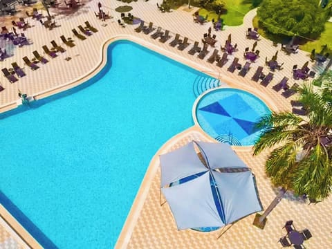 Dive into sparkling blue from above—pure vacation energy.
