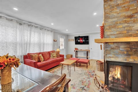Comfortable living room with a Smart TV for your entertainment.
