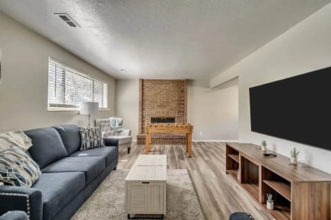 Relax in comfort with a smart TV, plush pull-out sofa, and mountain foothill views.