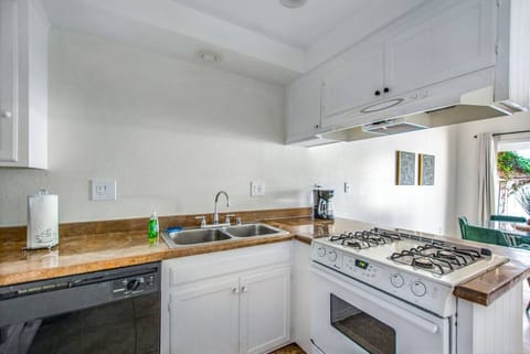 Fully equipped kitchen with all essentials for home-cooked meals.