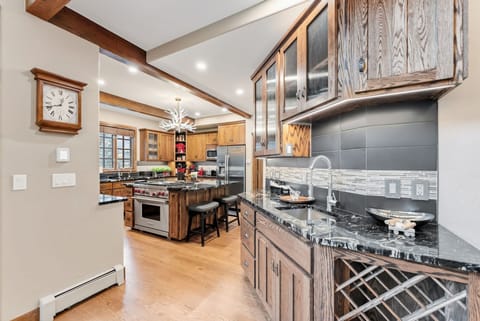 Kitchen: Drip coffee maker, Crockpot, blender, toaster, cooking utensils, tableware