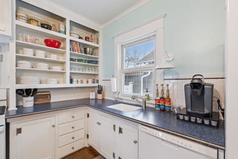 Fully stocked kitchen with coffee station