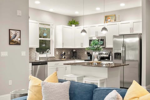 Open view of unit kitchen. 