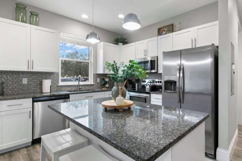 Featuring granite marble countertops. 