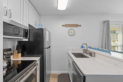 Your fully equipped kitchen awaits with modern appliances, ample counter space, and everything you need to prepare meals during your stay.