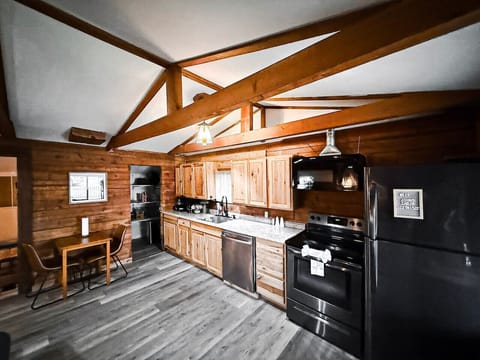 Spacious kitchen with modern appliances.