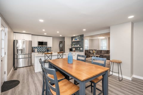 Make mealtime memories together at the dining table, seating 4​