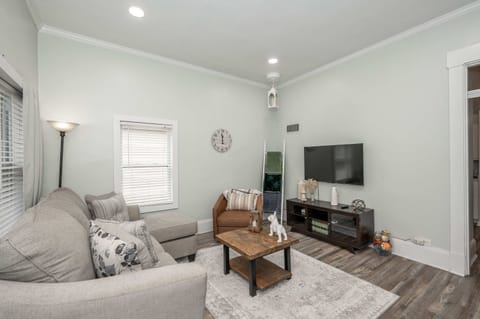 Curl up in the airy living room & stream your favorites on the smart TV​