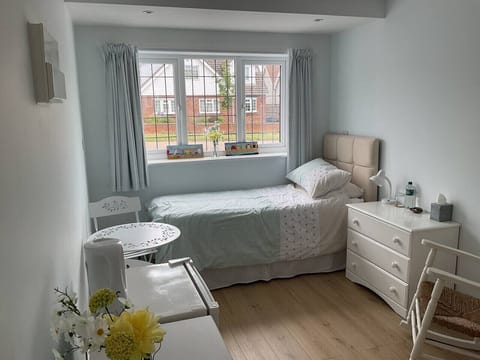 Peaceful bedroom with street view