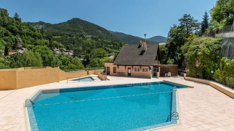 Take in gorgeous views while lounging around the on-site outdoor pool.