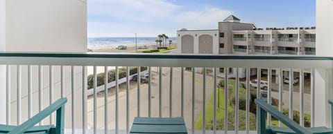 Relax on your private balcony with an angled Gulf view—Casa del Mar Galveston (representative image, not specific unit))