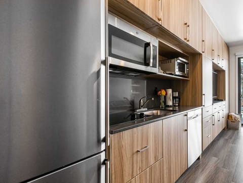 Full-size galley kitchen to prepare delicious snacks or meals.