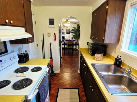 A light and bright kitchen makes preparing food and snacks easy.