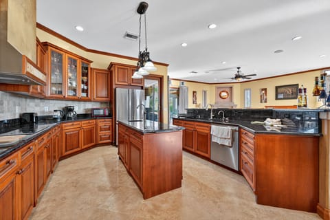 High-end stainless steel fridge, oven, and dishwasher for modern convenience.