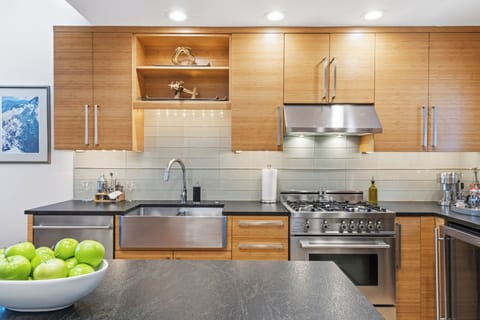 Chef’s kitchen with premium appliances and casual island seating