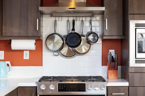 Kitchen equipped with stainless steel appliances.