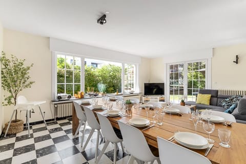 Living room with dining table and lounge area