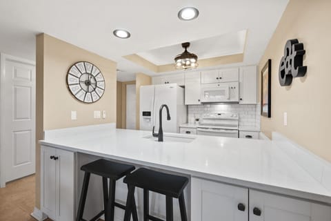 Fully Equipped Kitchen with Quartz Countertops