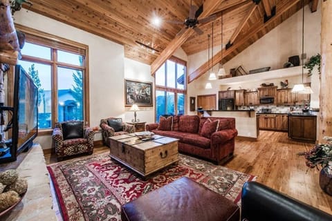 open living and kitchen area with western touches