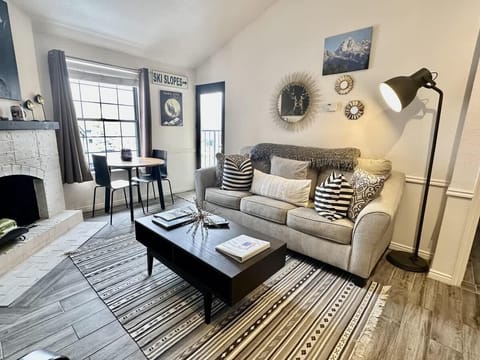 Cozy living room with comfortable couch bed.