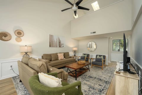 Gather around in this spacious living room, and stream your favorite movie or show on the Smart TV