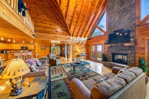 Spacious living room with plenty of comfortable seating for your entire group.