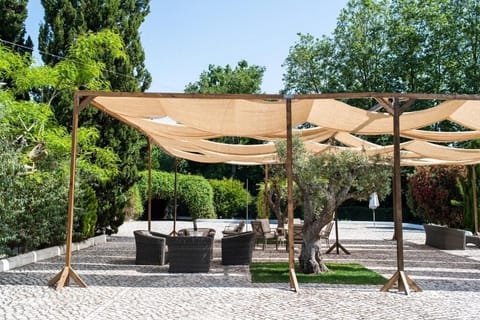 Spread out comfortably in the spacious courtyard lounge areas.