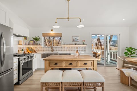 Thoughtful design details, open shelving, and plenty of prep space.