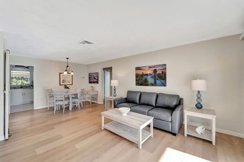 Your coastal getaway starts in this bright, welcoming space