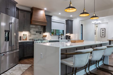 Modern, spacious kitchen + bar seating