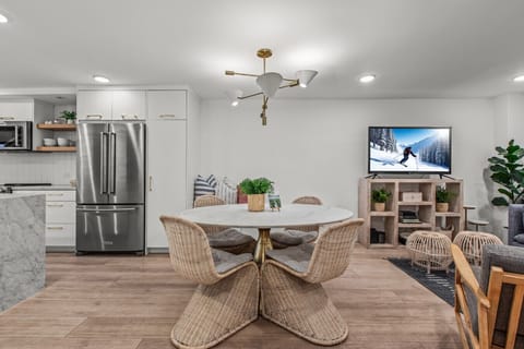 Dining table in the open layout of the condo