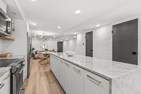 Large kitchen perfect for preparing meals or plating take out