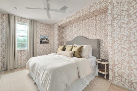 Sink into plush pillows in a chic, patterned retreat.
