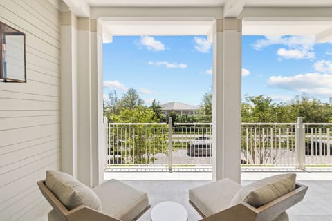 Soak up sunshine on the balcony with open-sky serenity.