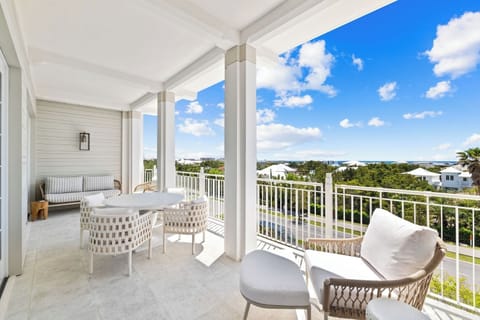 Bask in sunshine on the spacious balcony overlooking the coast.